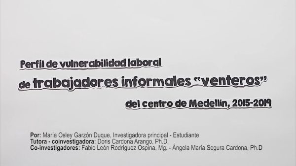Texto en una diapositiva que dice: “Perfil de vulnerabilidad laboral de trabajadores informales ‘venteros’ del centro de Medellín, 2015-2019”, seguido de nombres de autores e investigadores.